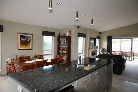 Quality kitchen and living area by Vision Homes